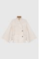 Women's double-sided beige sheepskin coat made of merino sheep