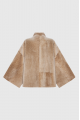 Women's double-sided beige sheepskin coat made of merino sheep