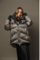 Long women's down jacket in dark metallic color with natural filler