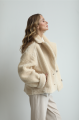 Two-sided beige sheepskin coat made of natural sheepskin