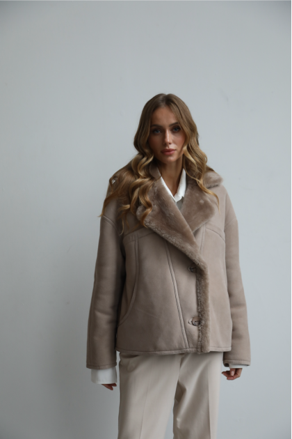 Suede sheepskin coat of beige color