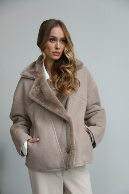 Suede sheepskin coat made of natural sheepskin in dark beige color