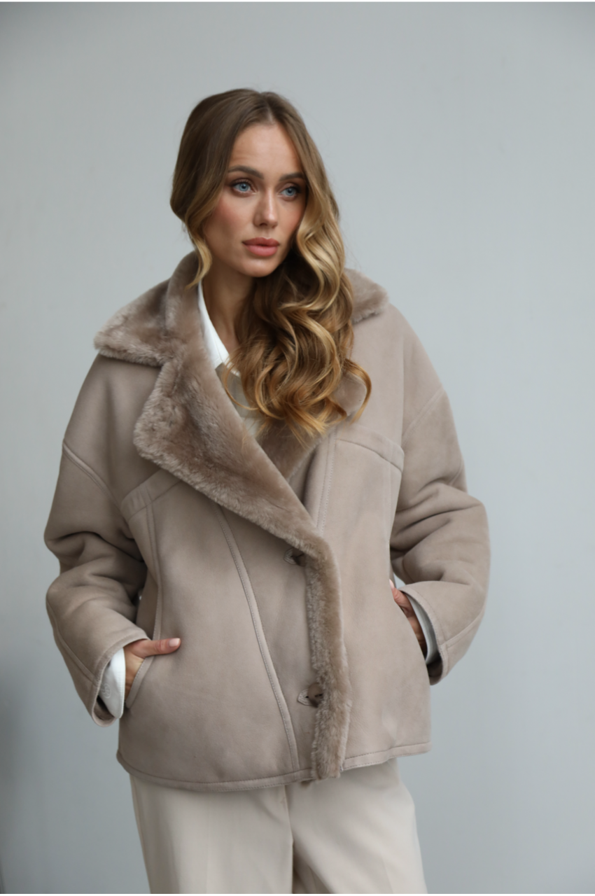Suede sheepskin coat made of natural sheepskin in dark beige color