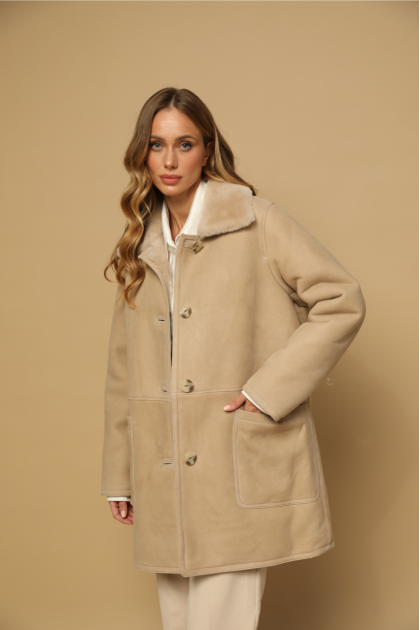 Stylish beige sheepskin coat