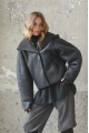 A short gray sheepskin coat with a hood made of natural sheepskin