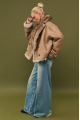 Short double-sided brown sheepskin coat made of cashmere lamb