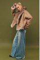 Short double-sided brown sheepskin coat made of cashmere lamb