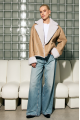 Double-sided short sheepskin coat made of natural sheepskin in beige color