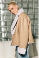 Double-sided short sheepskin coat made of natural sheepskin in beige color