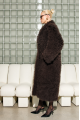 Long women's chocolate-colored fur coat made of cashmere goat
