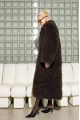 Long women's chocolate-colored fur coat made of cashmere goat