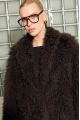 Long women's chocolate-colored fur coat made of cashmere goat