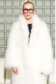 Long white fur coat made of cashmere goat