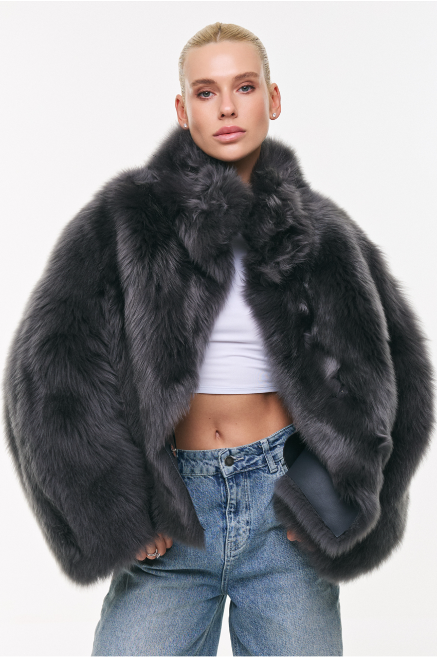 Short double-sided sheepskin coat in gray color made of cashmere lamb
