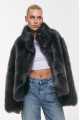 Short double-sided sheepskin coat in gray color made of cashmere lamb