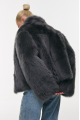 Short double-sided sheepskin coat in gray color made of cashmere lamb