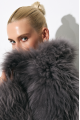 Stylish gray fur coat made of cashmere goat