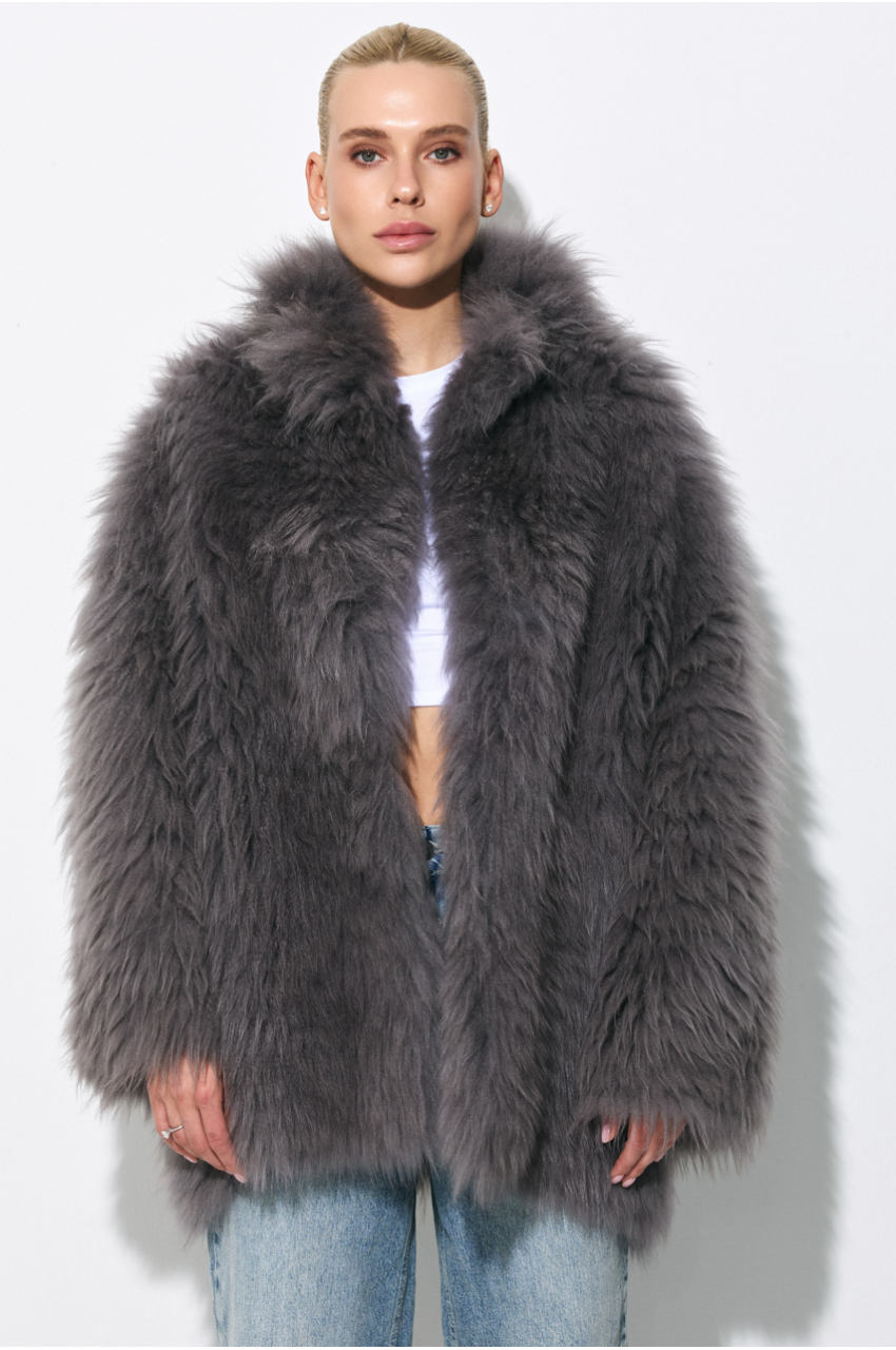 Stylish gray fur coat made of cashmere goat