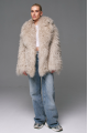 Stylish fur coat made of natural llama in beige color