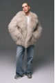 Stylish fur coat made of natural llama in beige color