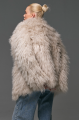 Stylish fur coat made of natural llama in beige color