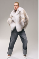 Stylish women's white fox fur coat with brown highlights