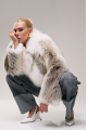 Stylish women's white fox fur coat with brown highlights