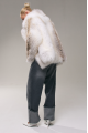 Stylish women's white fox fur coat with brown highlights