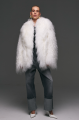 Stylish fur coat made of natural white llama