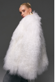 Stylish fur coat made of natural white llama