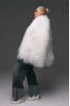 Stylish fur coat made of natural white llama