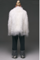 Stylish fur coat made of natural white llama