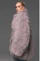 Women's fur coat made of natural cashmere goatskin in gray