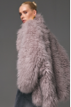 Women's fur coat made of natural cashmere goatskin in gray