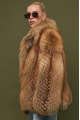 Stylish women's brown fox fur coat