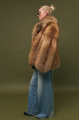 Stylish women's brown fox fur coat