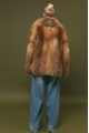 Stylish women's brown fox fur coat