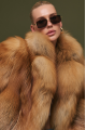 Stylish red fox fur coat