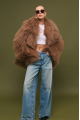 Women's brown fur coat made of natural llama fur