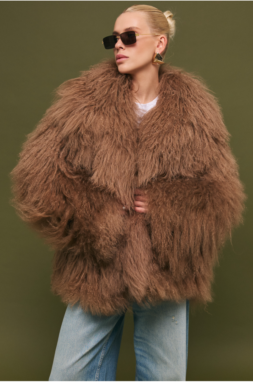 Women's brown fur coat made of natural llama fur