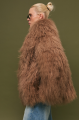Women's brown fur coat made of natural llama fur