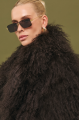 Women's chocolate-colored fur coat made of natural llama