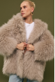 Women's fur coat made of natural cashmere goatskin in beige color