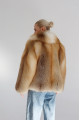 Short women's red fox fur coat