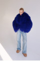 Stylish fur coat made of natural llama in blue