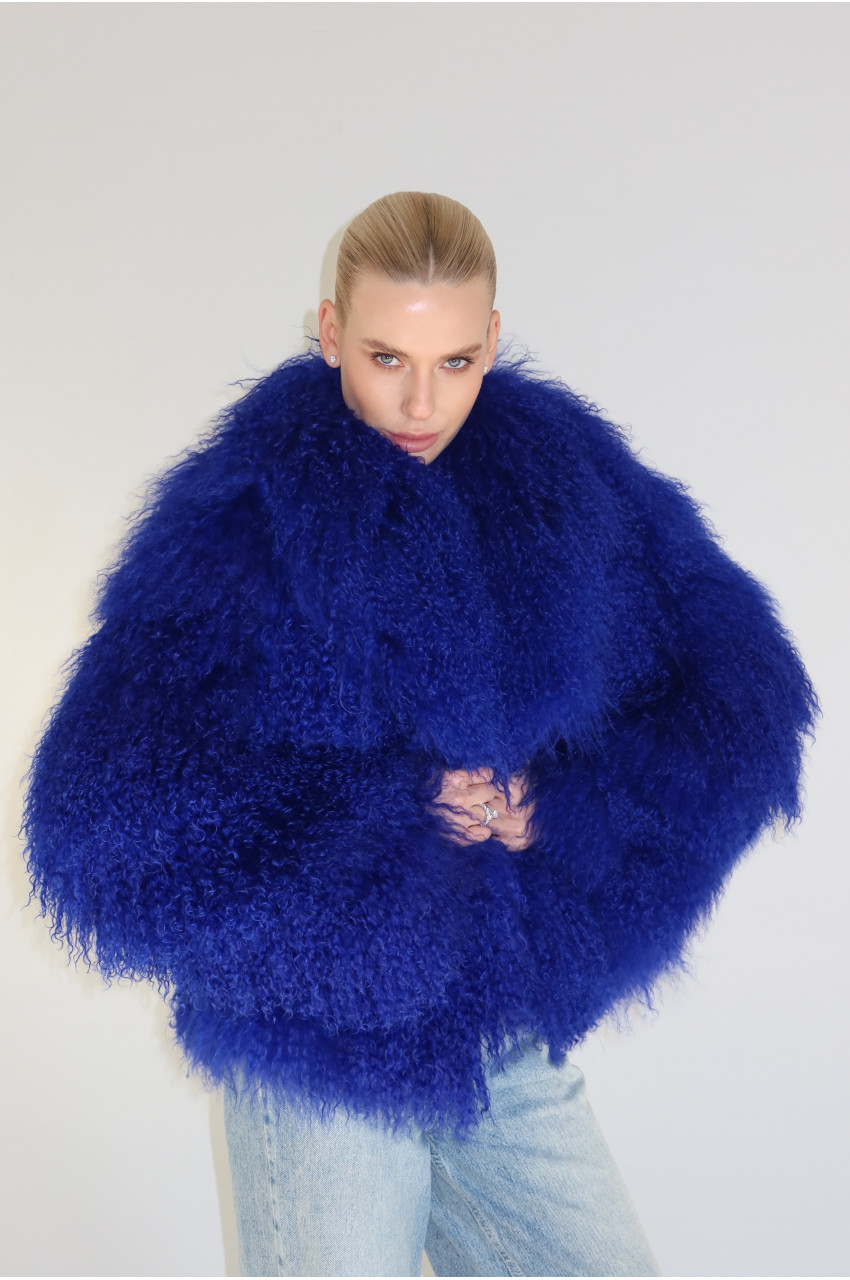 Stylish fur coat made of natural llama in blue