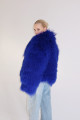 Stylish fur coat made of natural llama in blue