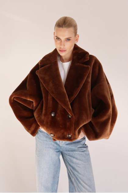 Reversible short copper-colored sheepskin bomber jacket