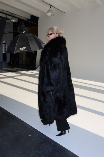 Long women's black fox fur coat
