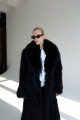 Long women's black fox fur coat